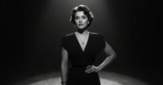 Image of Adriana Asti on stage in a tribute portrait.