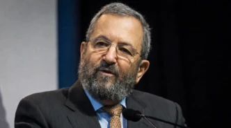 Ehud Barak speaking at a public event amid ongoing discussion around the Ehud Barak Epstein relationship