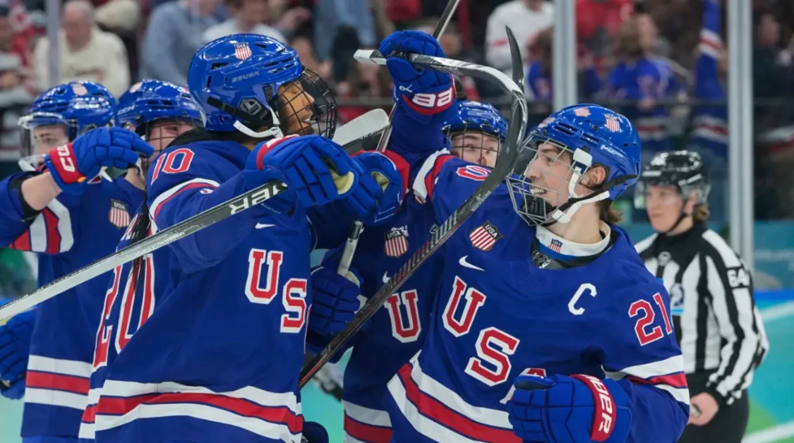 hilaryknight celebrates Team USA overtime gold medal win during Olympic women’s hockey final on the ice