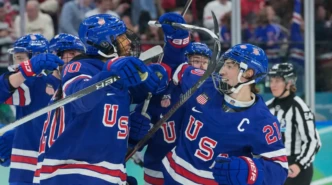 hilaryknight celebrates Team USA overtime gold medal win during Olympic women’s hockey final on the ice
