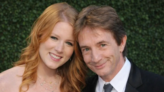 The Martin Short focus keyword image showing a man and young woman smiling together at an outdoor formal event