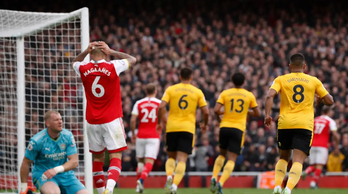 Wolves vs Arsenal players react near the goal during a tense Premier League match moment with no faces visible
